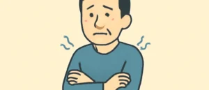 壁紙の断熱について、腕を組んで寒そうにしている男性のイラスト