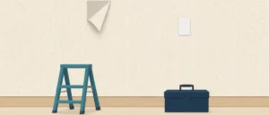 壁の角がめくれた壁紙と、床に置かれた脚立と工具箱